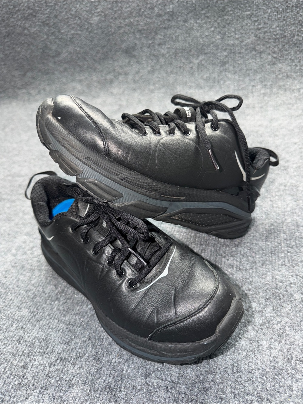 Hoka One One Black leather Walking Sneakers with Blue Lining